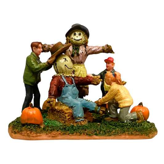 37027 - Lemax Building a Scarecrow Figurine |1-30|