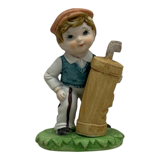34989 - Hummel Vintage Boy With Golf Bag 4" Ceramic |TBD|
