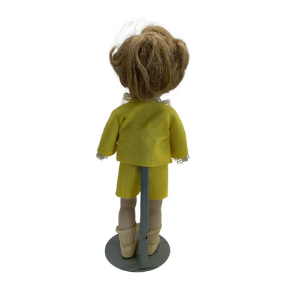 34037 - 13" January 1976 Moveable Porcelain Doll in Yellow Suit |TBD|